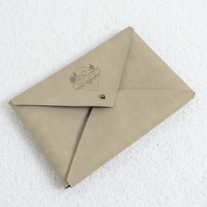 Vegan leather envelope in natural – front with engraving