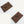 Vegan leather envelope in walnut – front with closure and back, both engraved